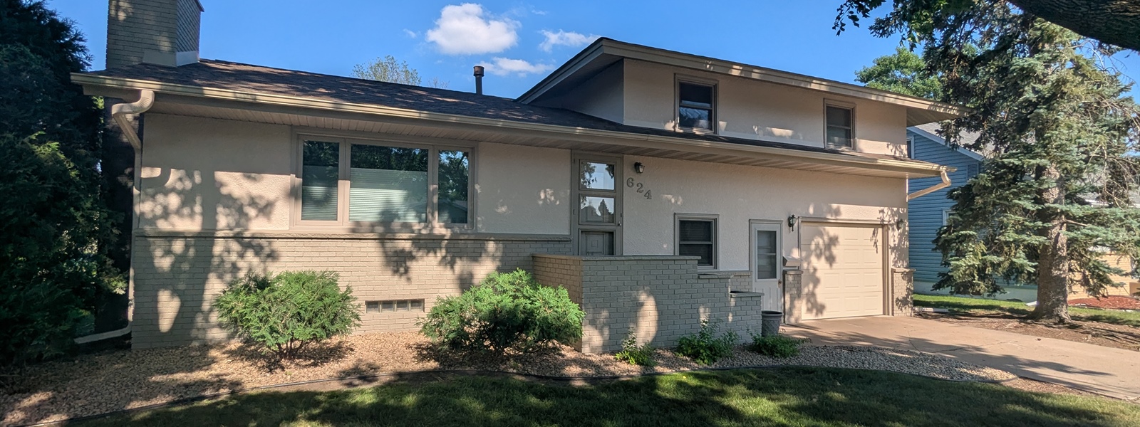 Advanced Stucco & Brick Painting Project in Osseo