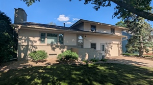 Advanced Stucco & Brick Painting Project in Osseo