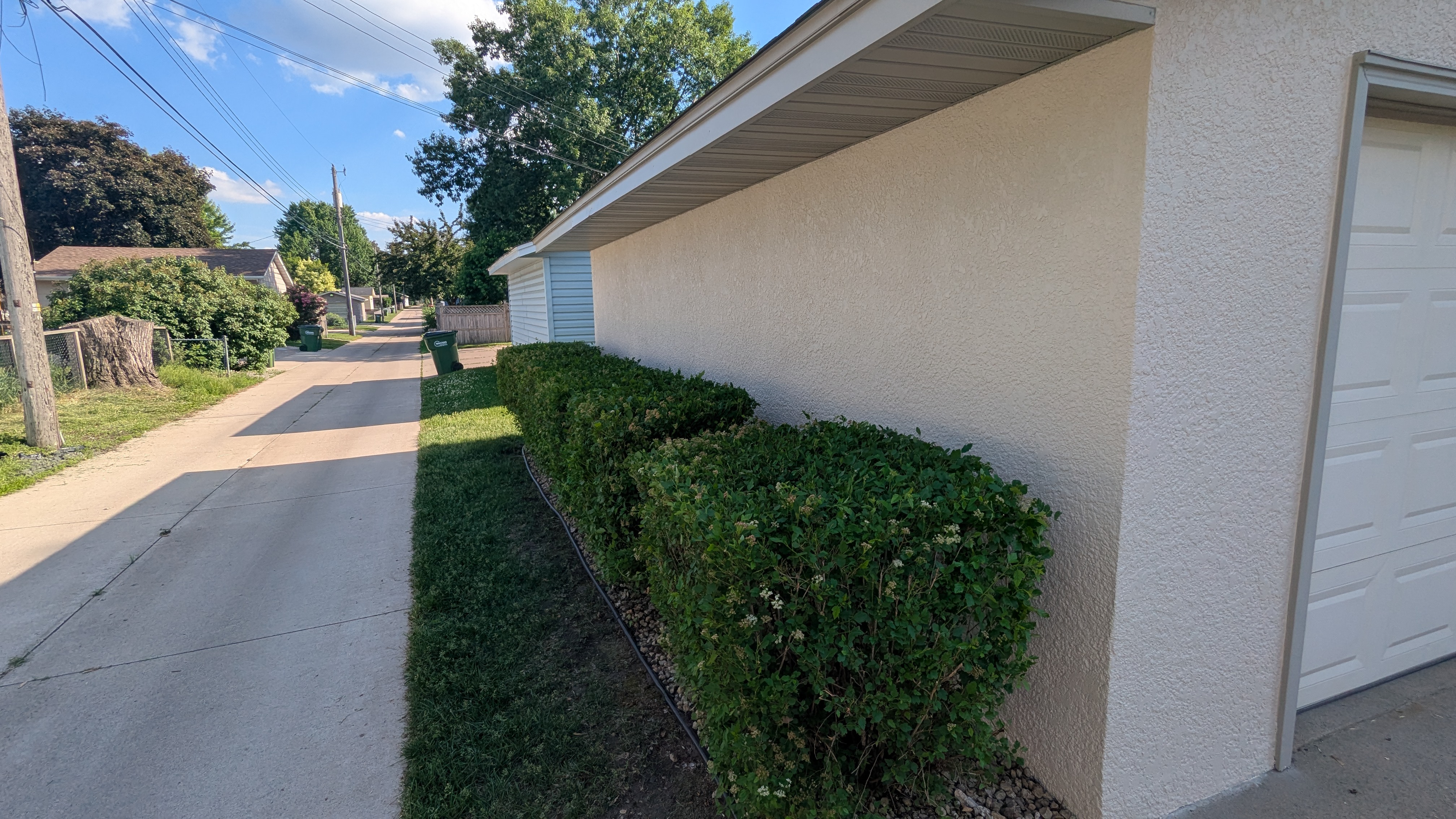 Advanced Stucco & Brick Painting Project in Osseo